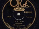 390.  Bix Beiderbecke - In a Mist & Wringin' and Twistin' - Okeh 40916