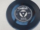 Peanuts Wilson Cast Iron Man Vinyl Coral 7