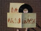 Genesis,A Trick Of The Tail,First pressing with matrix numbers A//1 & B//1,LP