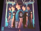 DEVO - NEW TRADITIONALISTS. MINT, VINYL LP w. POSTER & 7