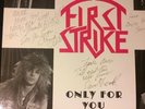 (Signed) FIRST STRIKE-