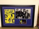 The Clash Hand Signed/Autographed Photograph with a poster and a COA