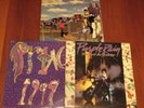3 PRINCE VINYL ALBUMS-PURPLE RAIN (W/ POSTER), 1999 & AROUND THE WORLD IN A DAY