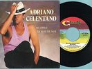 ADRIANO CELENTANO : MI ATTRAI / LUCE DEL SOLE - 45 GIRI RARISSIMO CLAN 1987