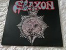Saxon Strong Arm of the Law LP Arz37679 from 1982 signed copy