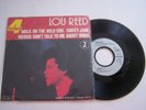 SP 4 TITRES VINYL 45 T , LOU REED , WALK ON THE WILD  . VG  / EX . TIRAGE LIMITE
