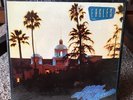 The Eagles Hotel California 7-ELEVEN-1084 Record Vinyl Record Album With Poster