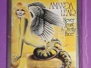 AMANDA LEAR. NEVER TRUST A PRETTY FACE. RARA MC CASSETTA SIGILLATA
