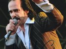 AUTHENTIC SIGNED NICK CAVE + THE BAD SEEDS 12 X 8 PHOTO....REAL SIGNATURE..COA.