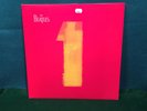 The Beatles. 1. LP Record UK Import Made in England 180 gm Vinyl NM/NM w/ Poster