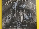 AEROSMITH.NIGHT IN THE RUTS.COVER SIGNED BY ENTIRE BAND SILVER PEN.COA