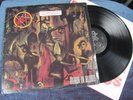 SLAYER   REIGN IN BLOOD    RARE 1st PRESS PROMO 1986 LP NM- w/ LANGUAGE STICKER