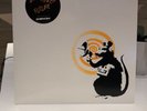 Dirty Funker - Future 12” Banksy Radar Rat Orange on White.