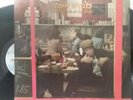Nighthawks at the Diner by Tom Waits produced by Electra/Asylum records 1975.