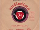 A Blank Unused Audiodisc Acetate with letter from a Studio on how to use.