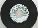 RIGHTEOUS FLAMES /  SLAVING IN BABYLON / BUS DEM SHUT VERSION / 7''/ VG+