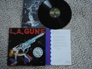 LA L.A. GUNS 1 X VINYL FIRST PRESS PROMO FLYER COCKED AND LOADED POLYGRAM kiss
