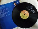 A SIGNED LONG PLAY VINYL RECORD FROM BRUCE SPRINGSTEEN - BORN IN THE USA.