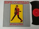ELVIS COSTELLO LP MY AIM IS TRUE 1977 COLUMBIA JC35037 CUSTOMATRIX PITMAN PRESS