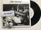 THE NORMAL - WARM LEATHERETTE SIGNED RARE 7'' RECORD AUTOGRAPHED + BADGE SET
