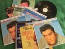 Elvis Presley 45-RPM ( 1950's ) records - Mint Condition with carrying case