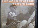 VINYL RECORD ALBUM THIS LAND IS YOUR LAND WOODY GUTHRIE SHRINK EX EX FTS 31001