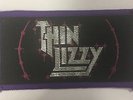 THIN LIZZY - VINTAGE WOVEN SEW ON PATCH - BLACK, PURPLE & SILVER (70s / 80s)