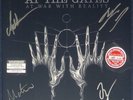 At The Gates - At War With Reality on Red vinyl. Signed sleeve.