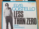 ELVIS COSTELLO first 7“ GERMAN IMPORT with BLUE RIMMED SLEEVE 'Less Zero' 1977