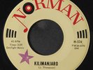QUARTETTE TRES BIEN: Kilimanjaro / Secretly 45 (sm tol, rubber stamp ol, sl wa