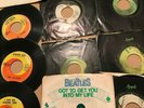 Twelve Beatles 45's including Three Very Early- Most with Sleeves- G/VG Cond.