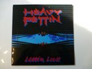 Heavy Pettin Lettin' Loose vinyl album signed by all original members
