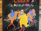 QUEEN - A KIND OF MAGIC 12