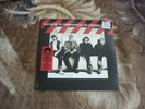 U2 - HOW TO DISMANTLE AN ATOMIC BOMB - HMV EXCLUSIVE RED VINYL + LYRIC BOOKLET