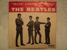 The Beatles - Reissued She Loves You on red and white Swan label 4142 W/Sleeve