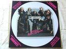 SCORPIONS passion rules the game..SHAPE PICTURE DISC HARVEST-HARP5242 YEARS 1988