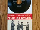 The Beatles”She Loves You” 1964 picture sleeve + record vg- condition USA.