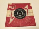 Elvis Presley 45rpm ( Wear My Ring Round Your Neck / Doncha’ think it’s time. ).