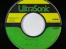 Reggae 45 RONNIE DAVIS Run Around Girl/Running Dub on Ultra Sonic blank