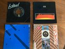 U2 7” 45 rpm 4 Records A Celebration, 11 O’Clock Tick Tock, Fire, Silver & Gold