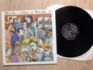 THE RUTS . GRIN & BEAR IT LP