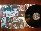 U2 Achtung Baby Box Set 4 records. 2 black 2 blue 14 page booklet Perfect NM