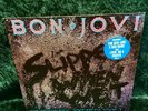 BON JOVI-SLIPPERY WHEN WET VINYL LP IN EX+ CONDITION A-1 & B-1 COVERS IN EX+ CON