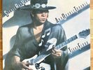 STEVIE RAY VAUGHAN AND DOUBLE TROUBLE - TEXAS FLOOD  LP VINYL RECORD ALBUM