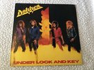 Dokken Under Lock and Key Original Vinyl lp very good condition