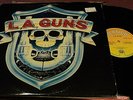 L.A. GUNS S/T L.A. GUNS LP VERTIGO LABEL W/ INNER GUNS N ROSES FROM 1988 VG+