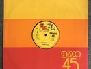 Ronnie Davies - The World Is A Stage/Stop The Loafing 12” - (GG 047) *Roots/Dub*