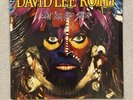 David Lee Roth ?– Eat 'Em And Smile LP Warner Bros. Records ?– 9 25470-1-1986