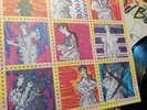 DAVID BOWIE ASHES TO ASHES VINYL RECORD AND STAMPS.