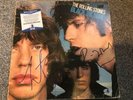 The Rolling Stones Black and Blue LP duel signed Ronnie/Charlie / Beckett authen